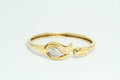 Bracciale rigido in Oro Giallo con Diamanti