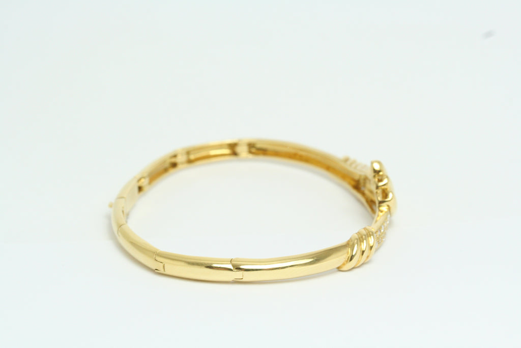 Bracciale rigido in Oro Giallo con Diamanti