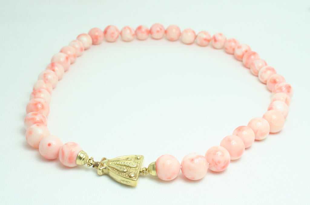 Collana in Corallo rosa con chiusura in Oro Giallo