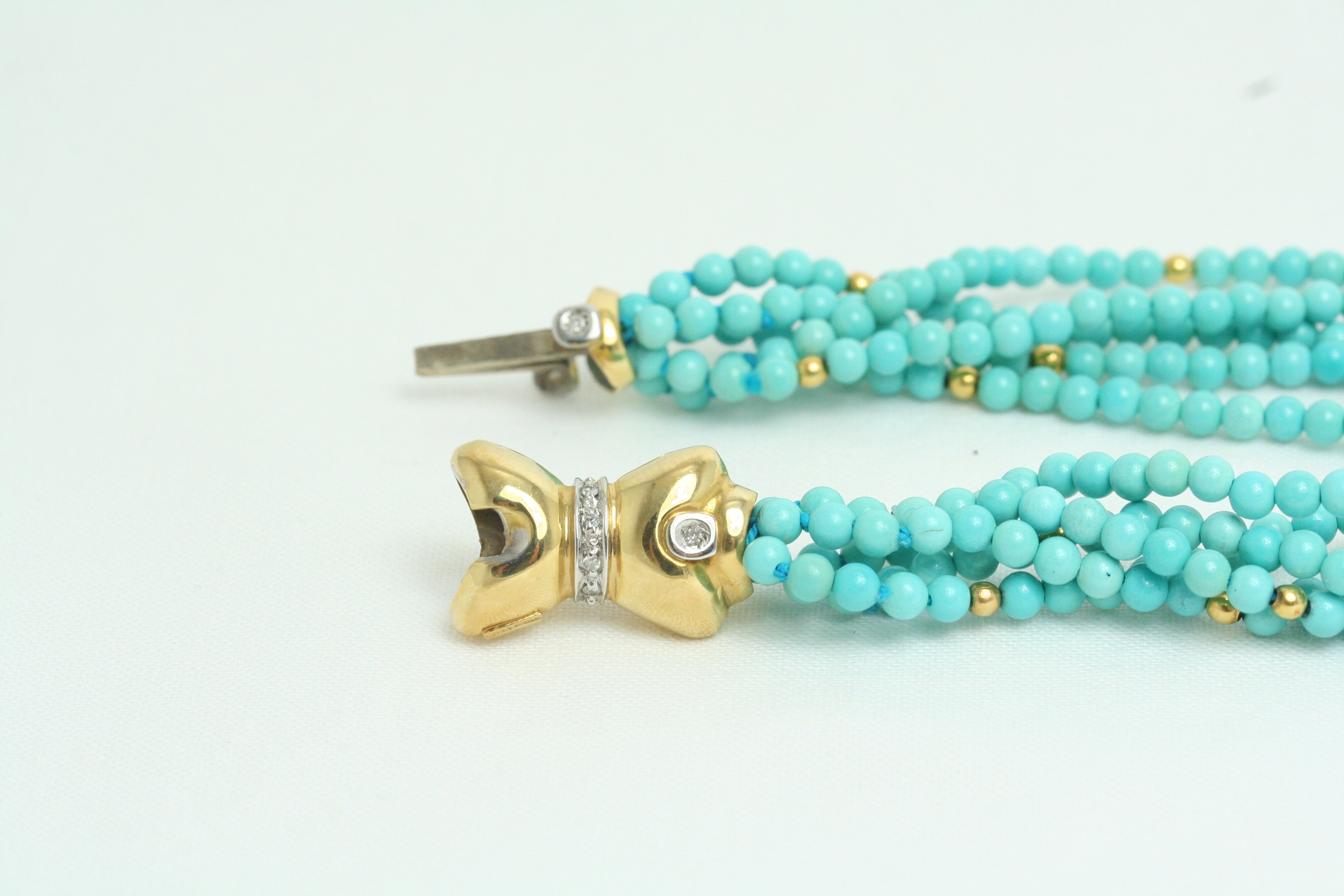 Collana torchon in Turchese con chiusura in Oro Giallo e Diamanti